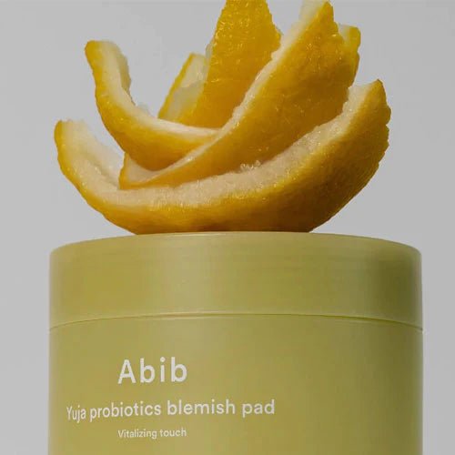 Abib Yuja Probiotics Blemish Pads close up of packaging with peels on top
