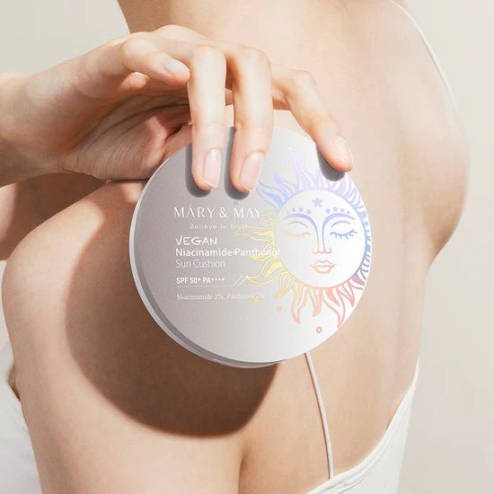 Mary&May Niacinamide Panthenol Sun Cushion being held by model